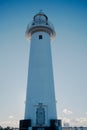 Towering Lighthouse on Cape of Japanese Coastline